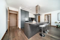 Modern 2-bedroom 2-bathroom flat with porter for sale in Prime central London